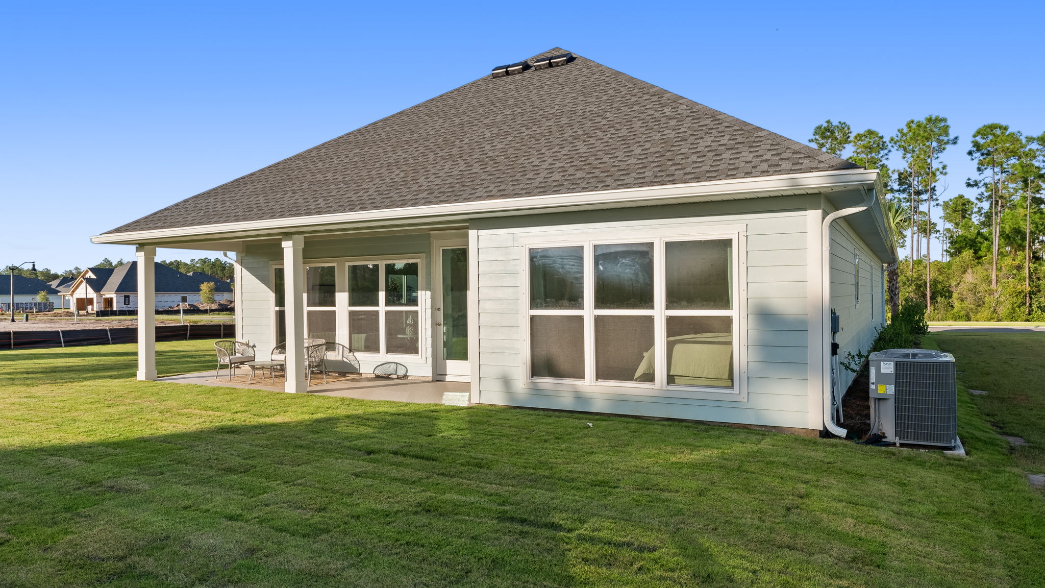 There is a covered patio at the back of the home with space for a dining area or lounge space