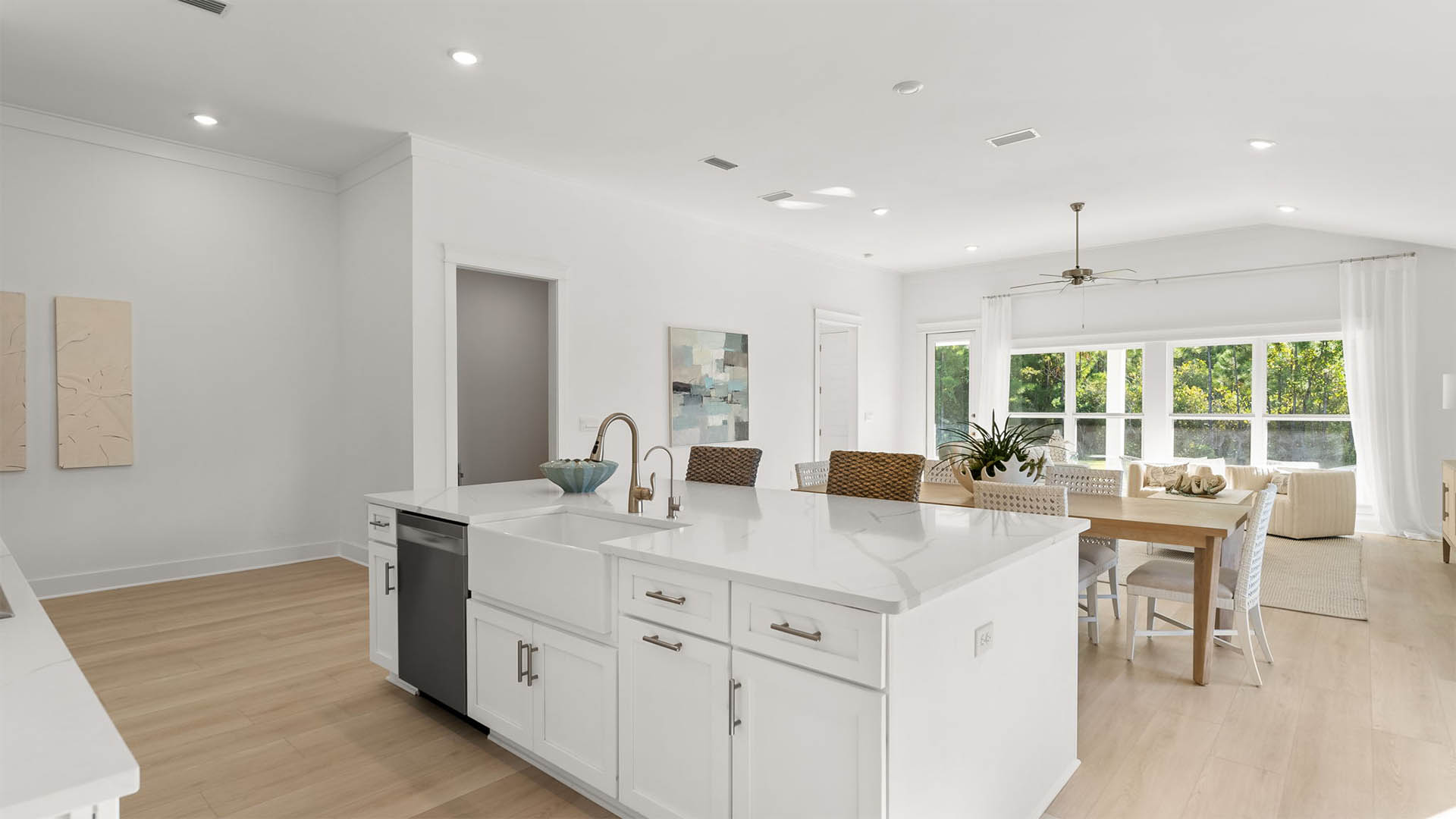 The kitchen is open to the living and casual dining area