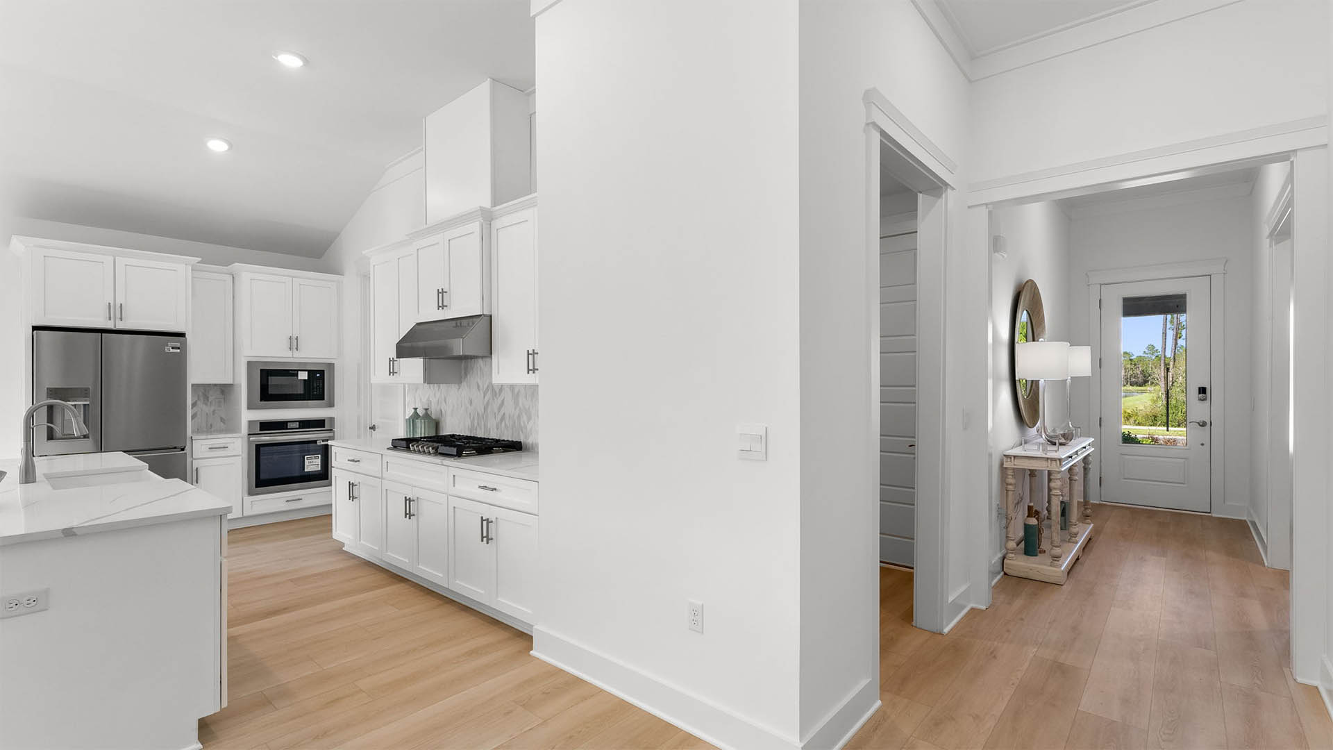 The foyer leads to the open concept floor plan