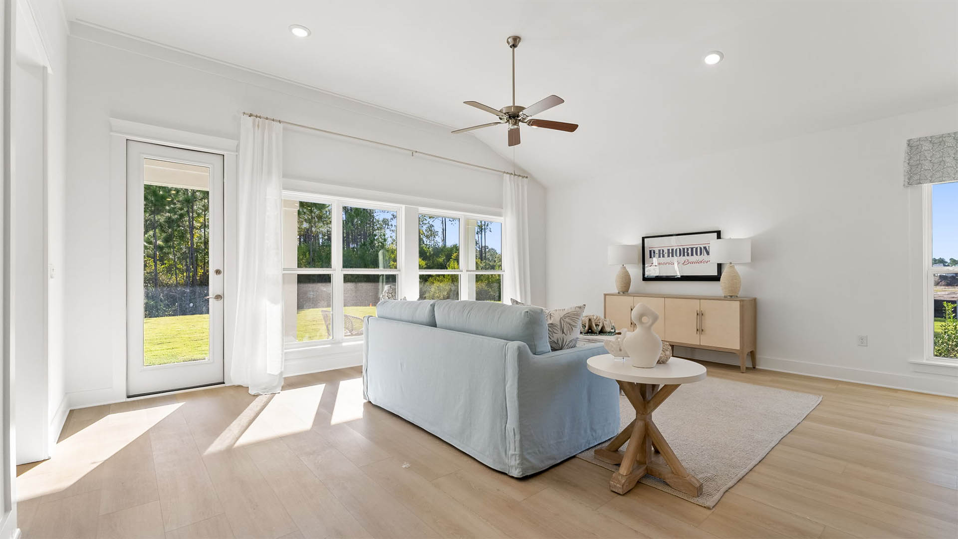 There is a covered back patio accessible from the living area