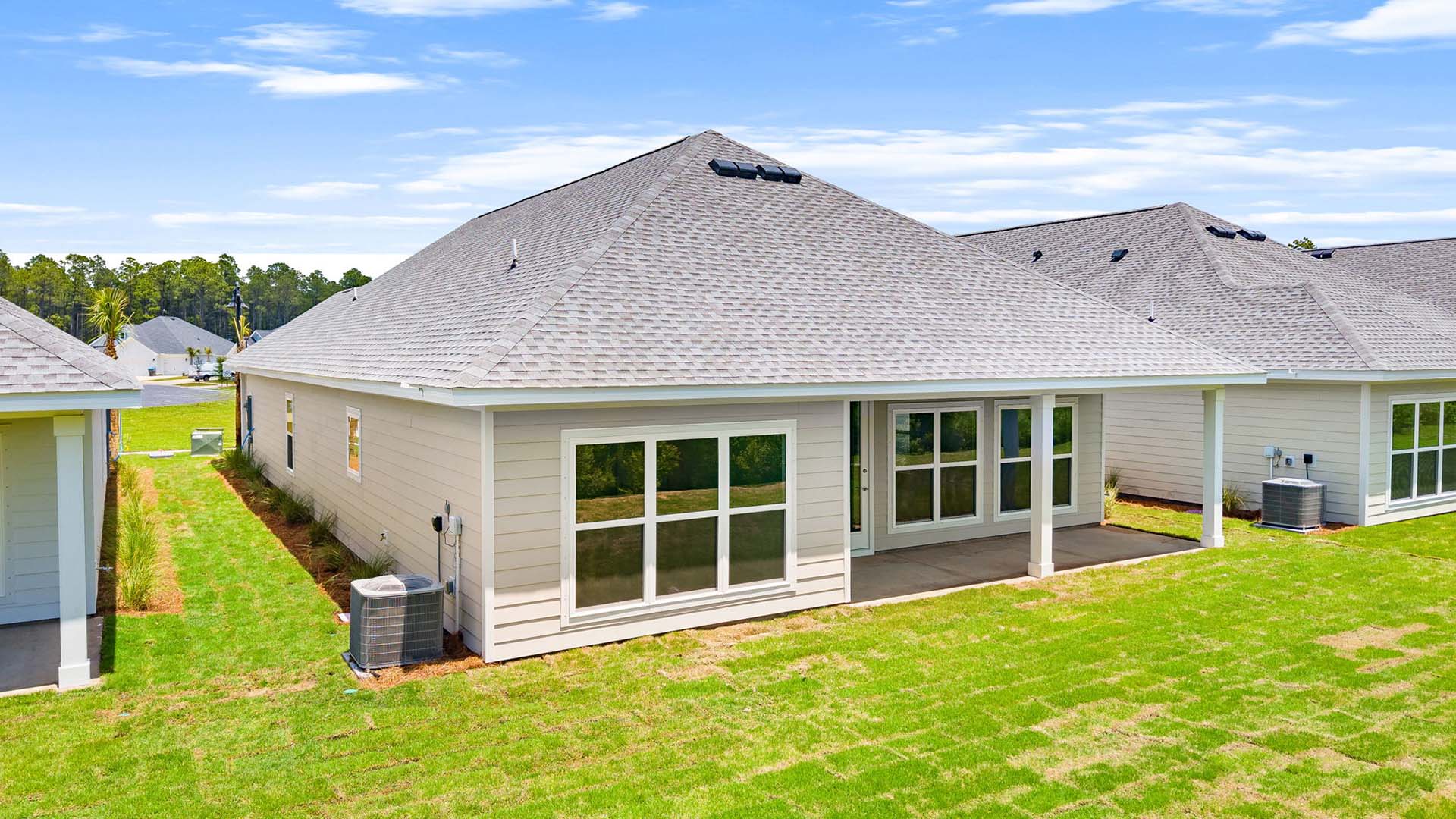 There is a covered patio at the back of the home
