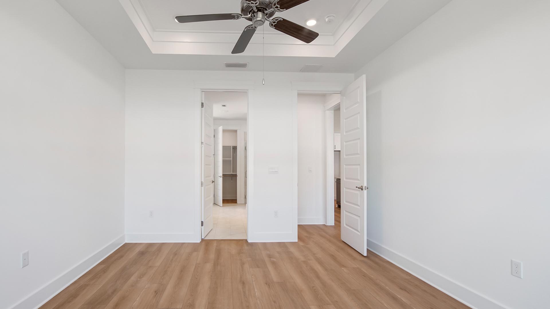 The primary bedroom has a  private ensuite bathroom with tile floor