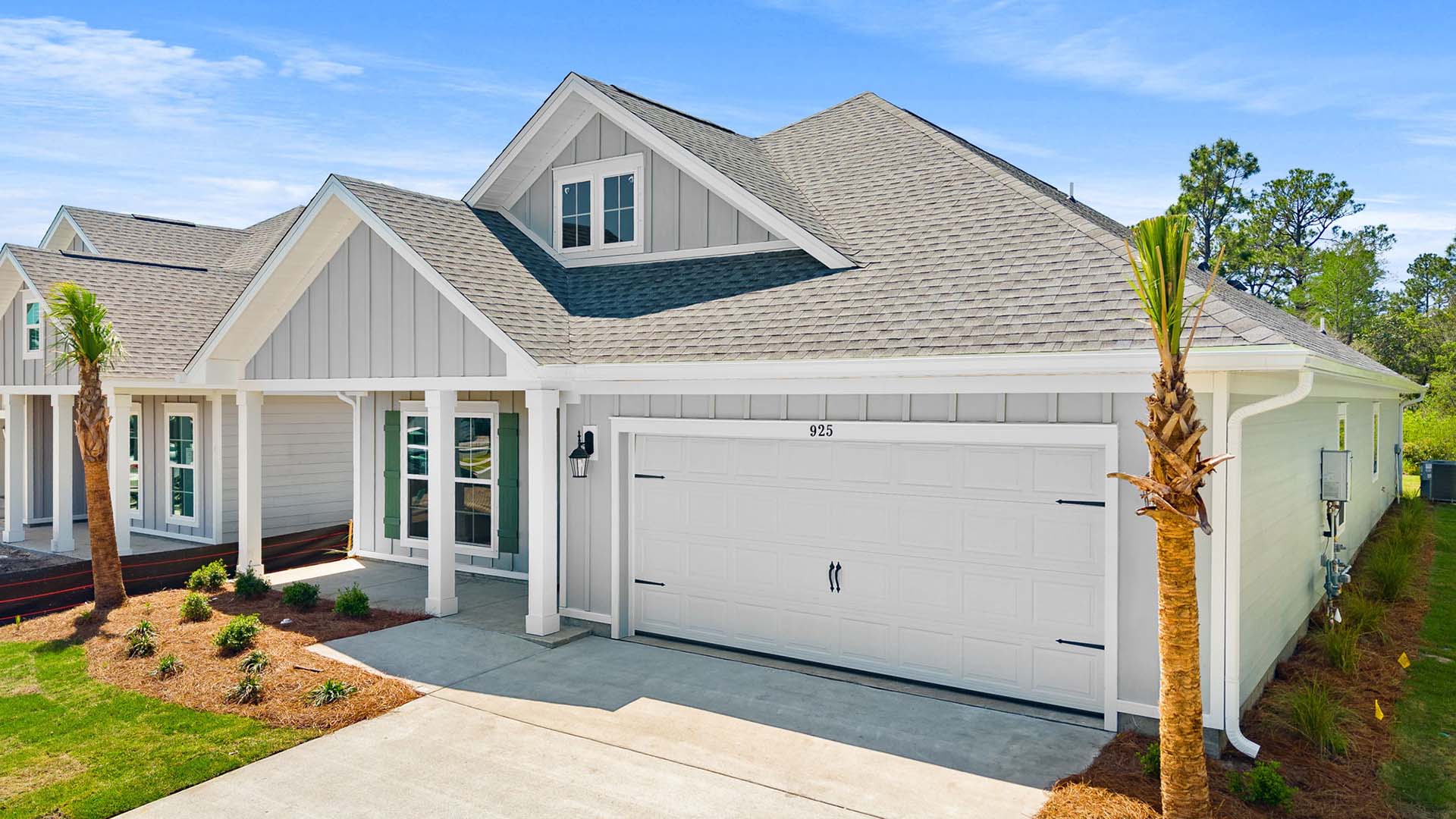 This home has a covered entry and front patio