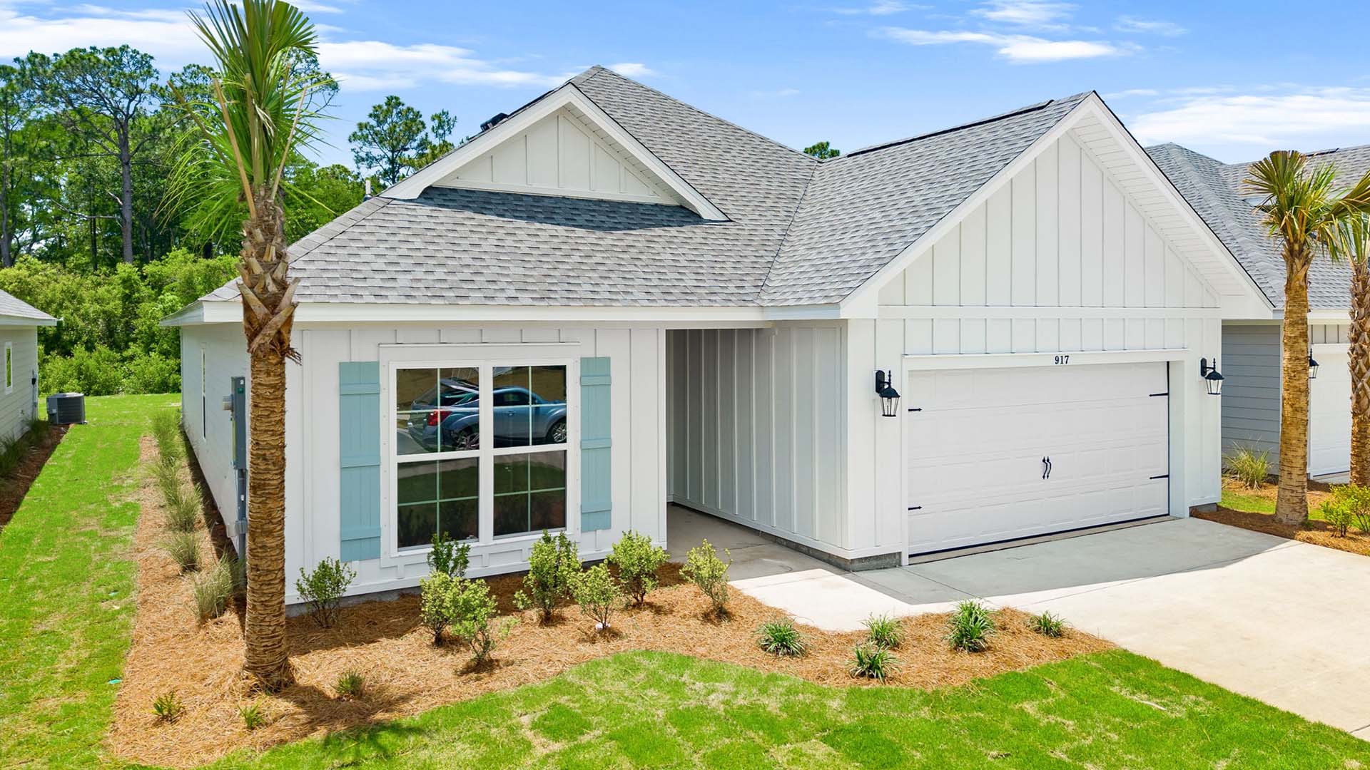This home has a covered entry and two car garage