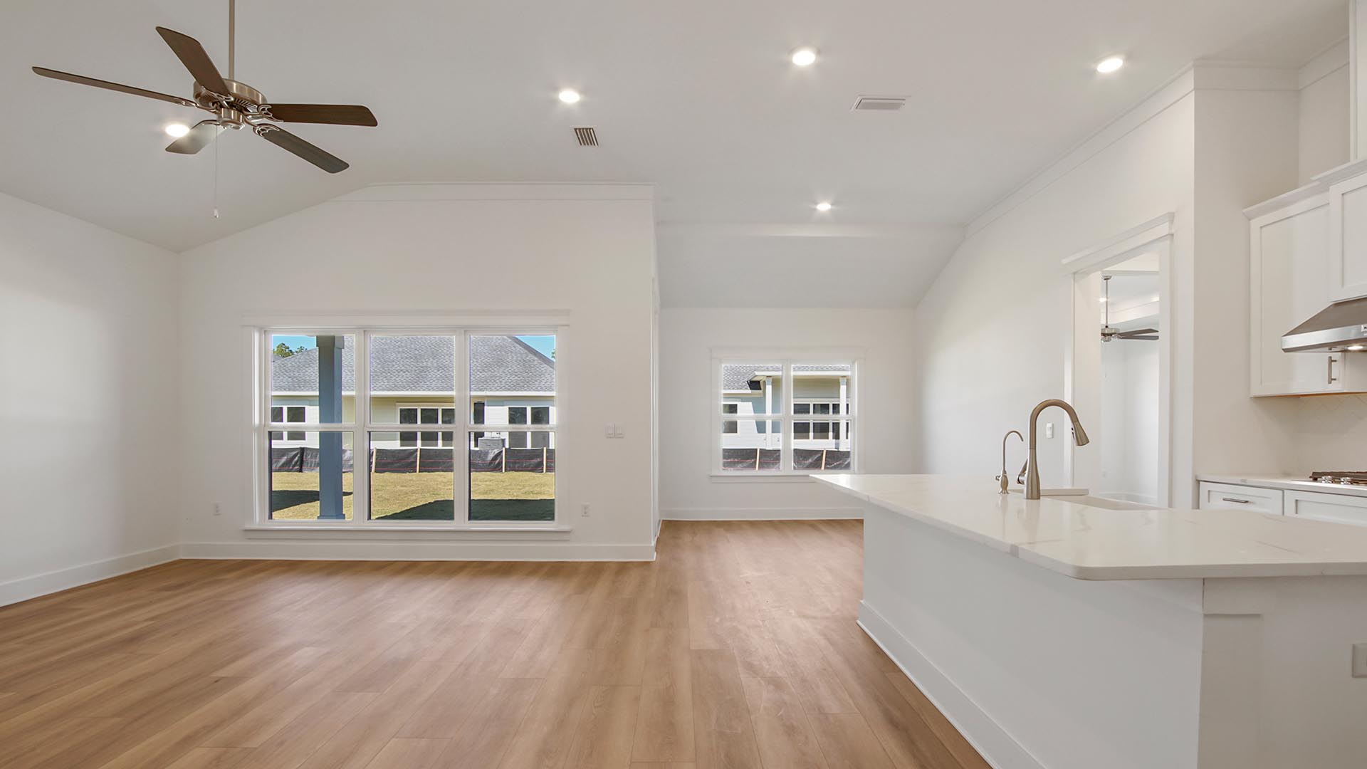 Open and spacious living area with beautiful EVP floors