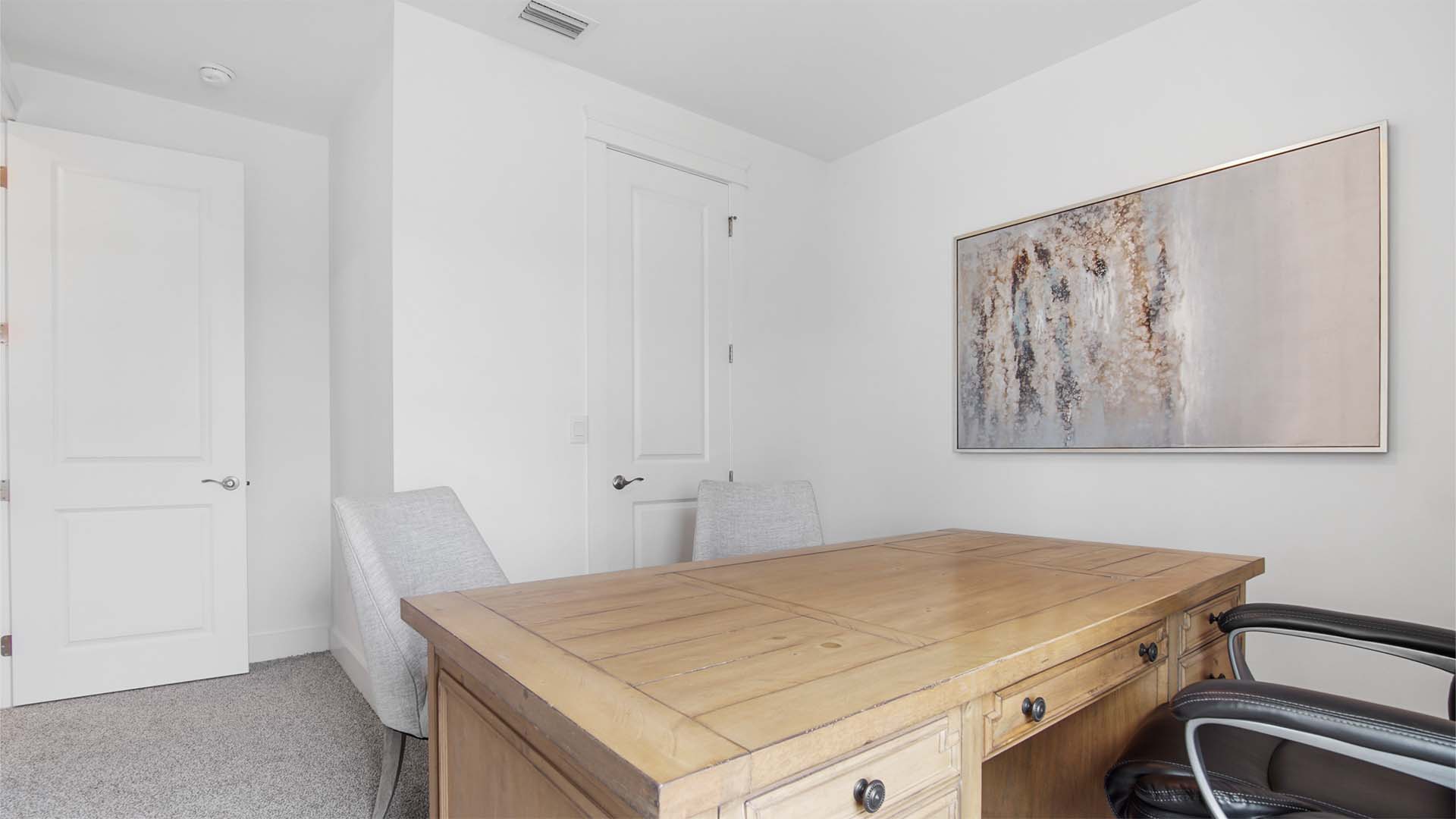 Bedroom four with carpet flooring and a closet.