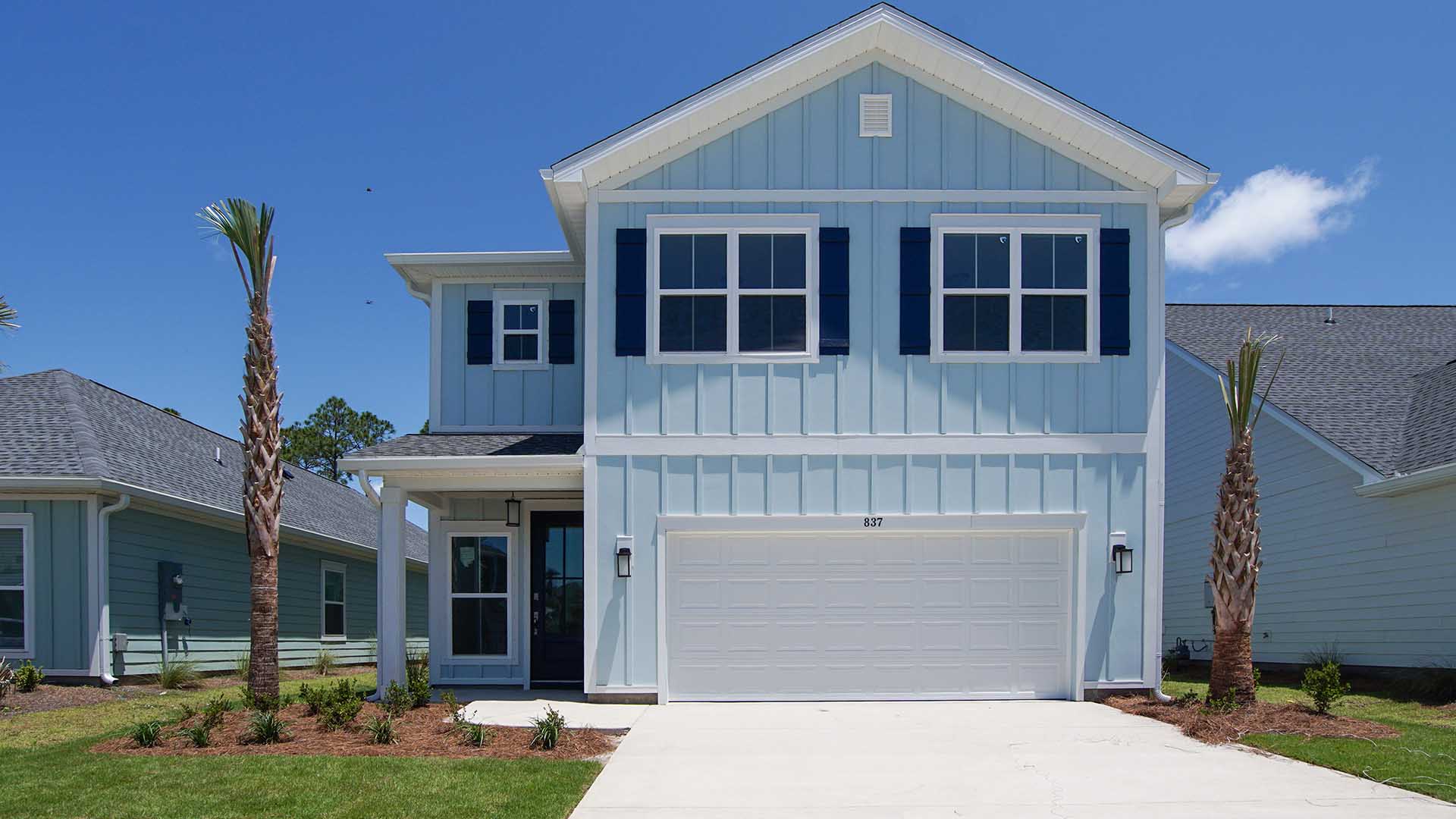 The Key Largo floor plan is a two story five bedroom three-and-a-half-bathroom floor plan with two car garage