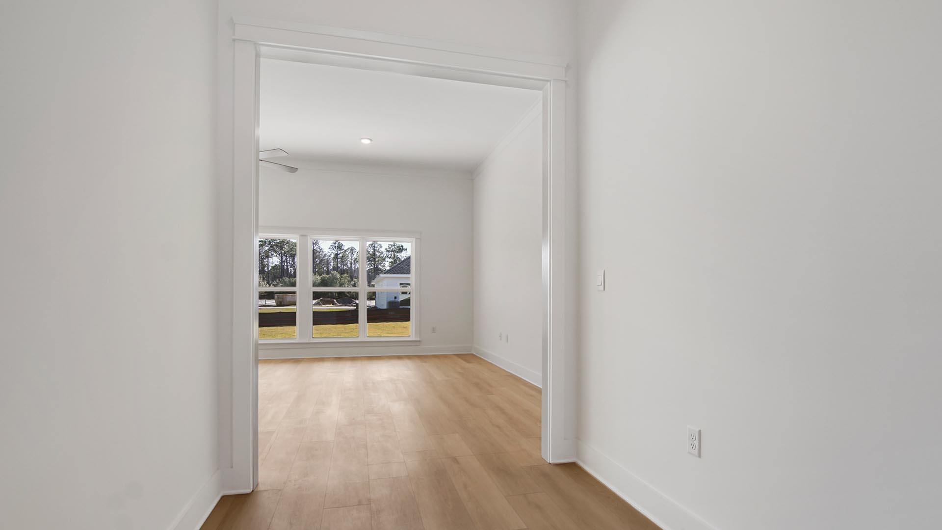 Entry hall leading to the grand living space in the Camelia floor plan