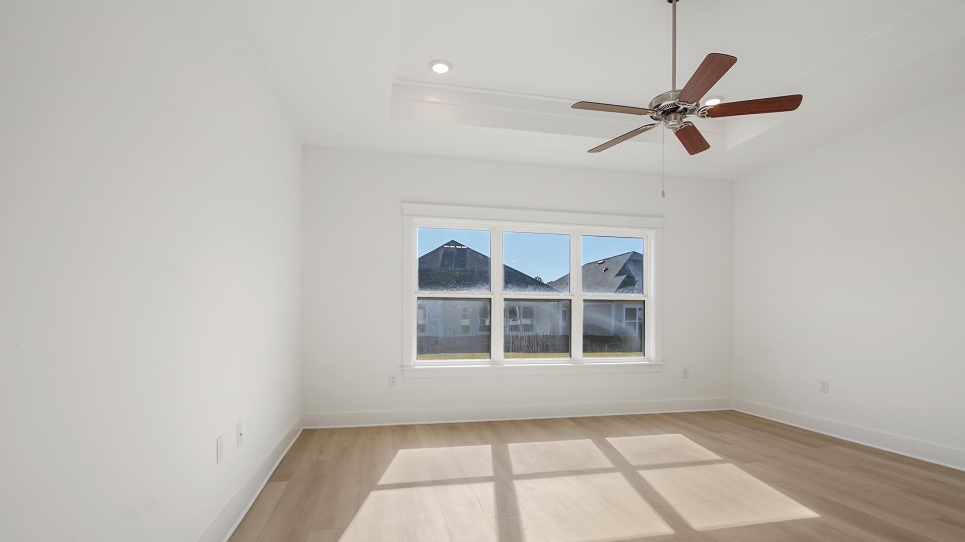 Primary bedroom with large picture window