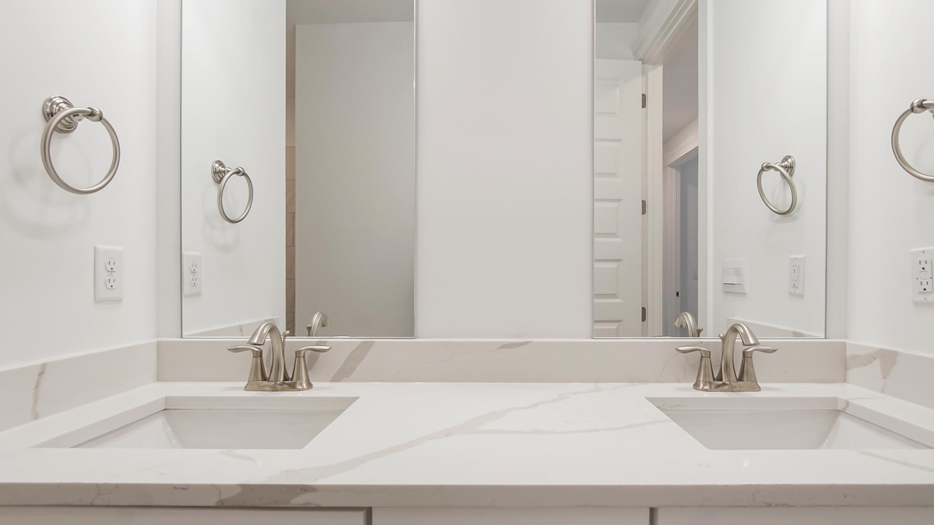 The full bath features a dual sink vanity