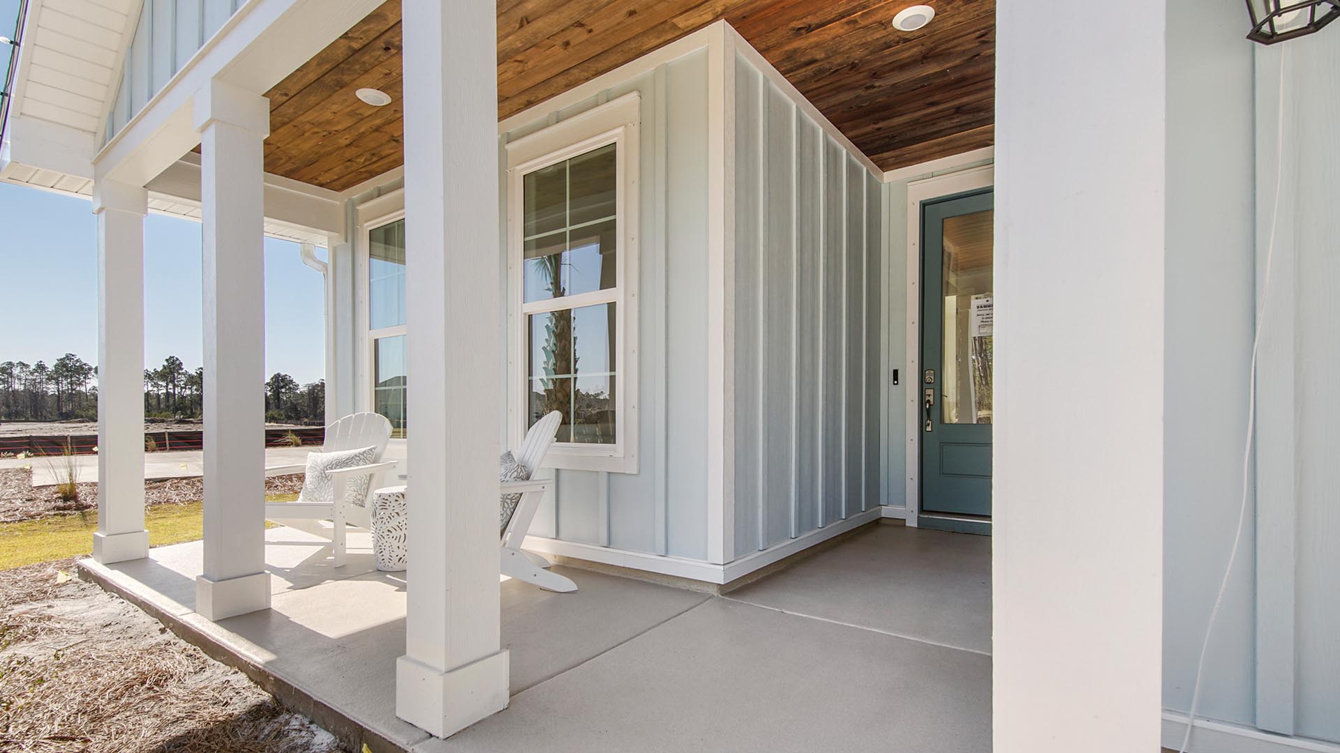 The Jubilee features a covered entry and has three bedrooms and two full bathrooms with a two car garage