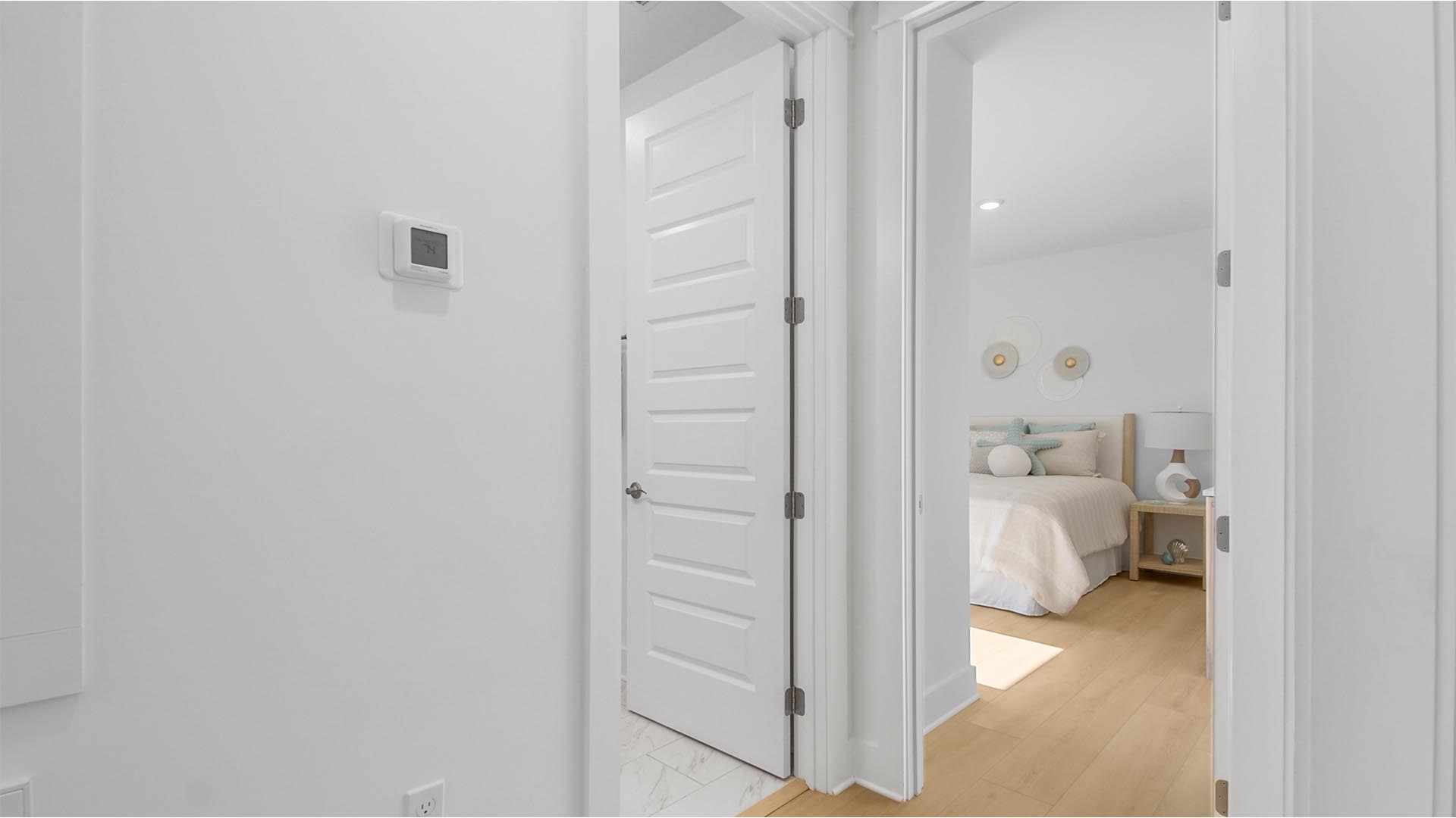 Bedrooms two and three are located off the foyer and have a shared bathroom