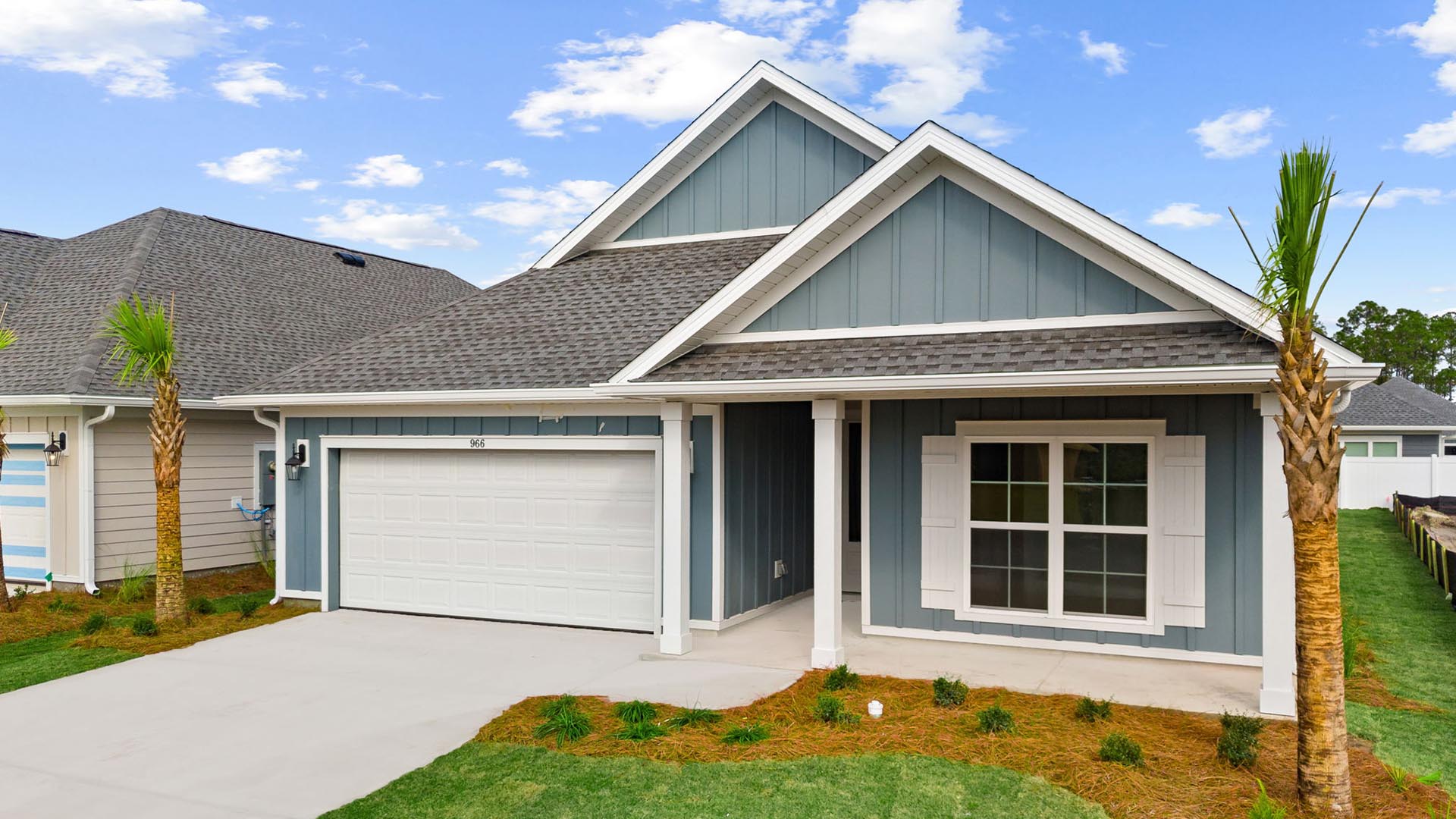 This home has a covered front porch with space for seating