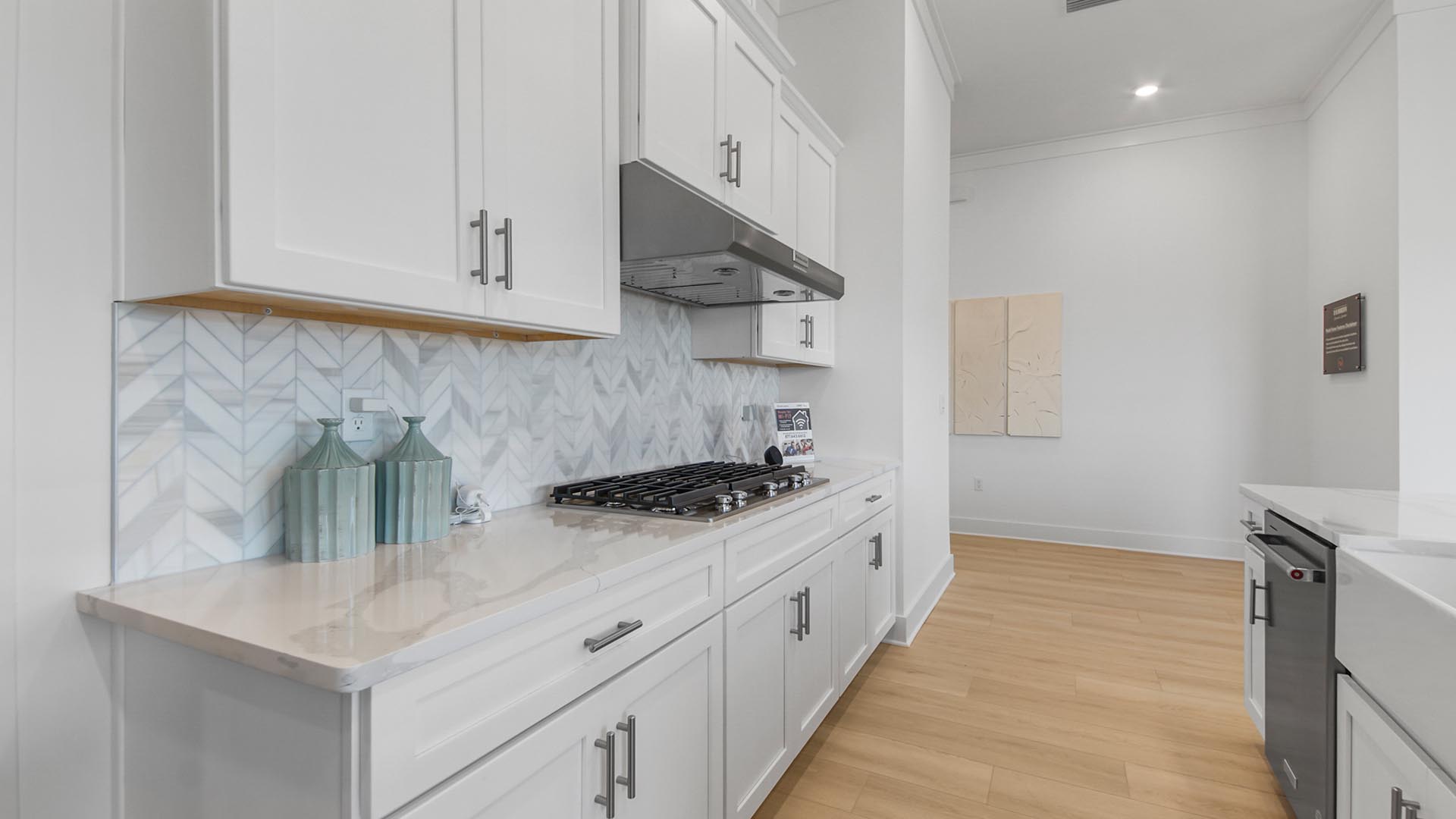 Beautiful upper and lower cabinetry throughout the spacious kitchen