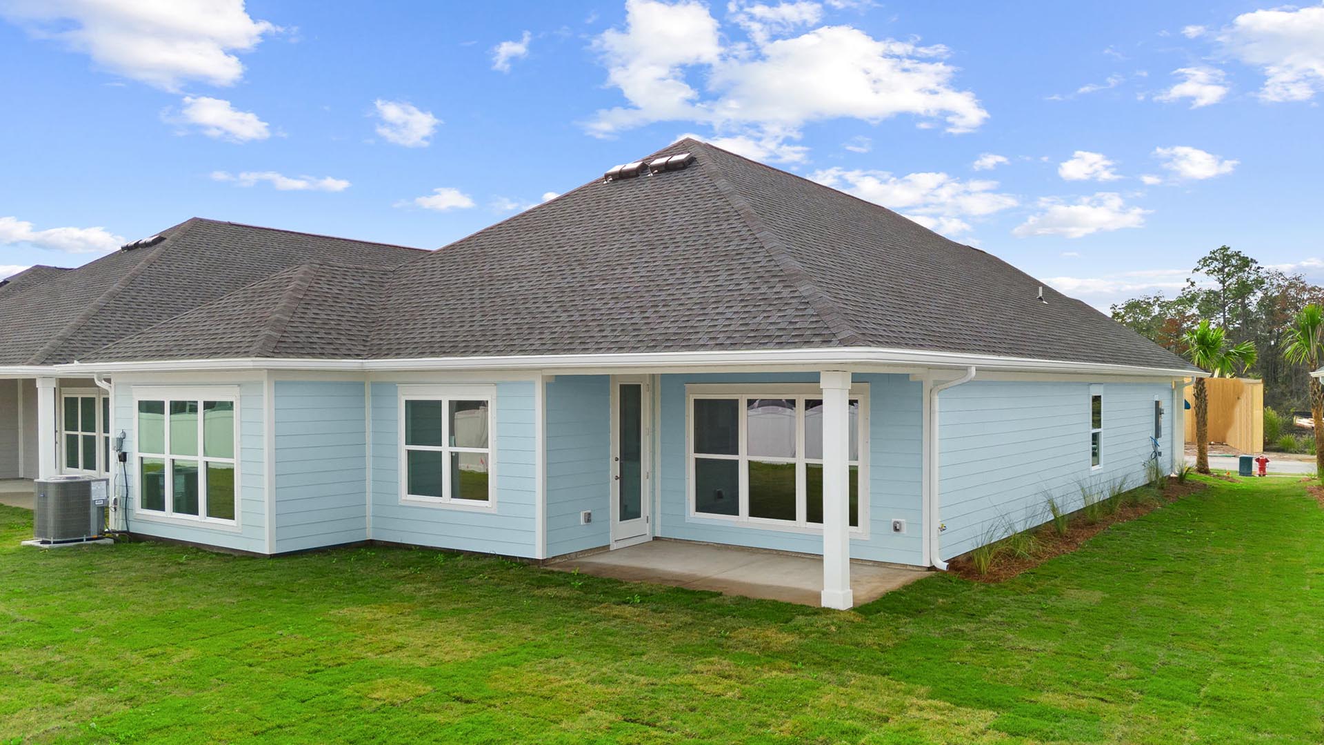 There is a large covered patio at the back of the home