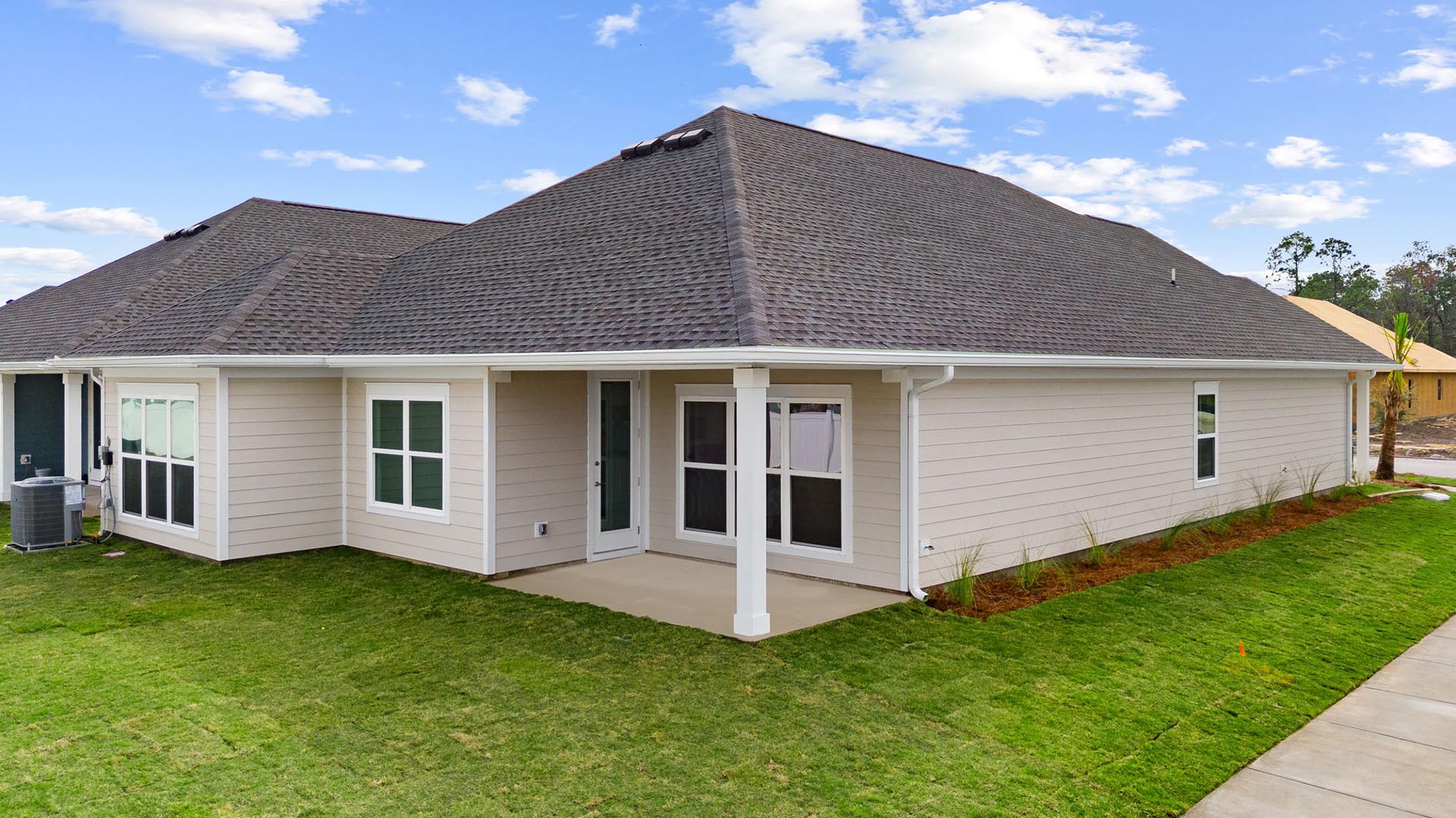 There is a covered patio at the back of the home