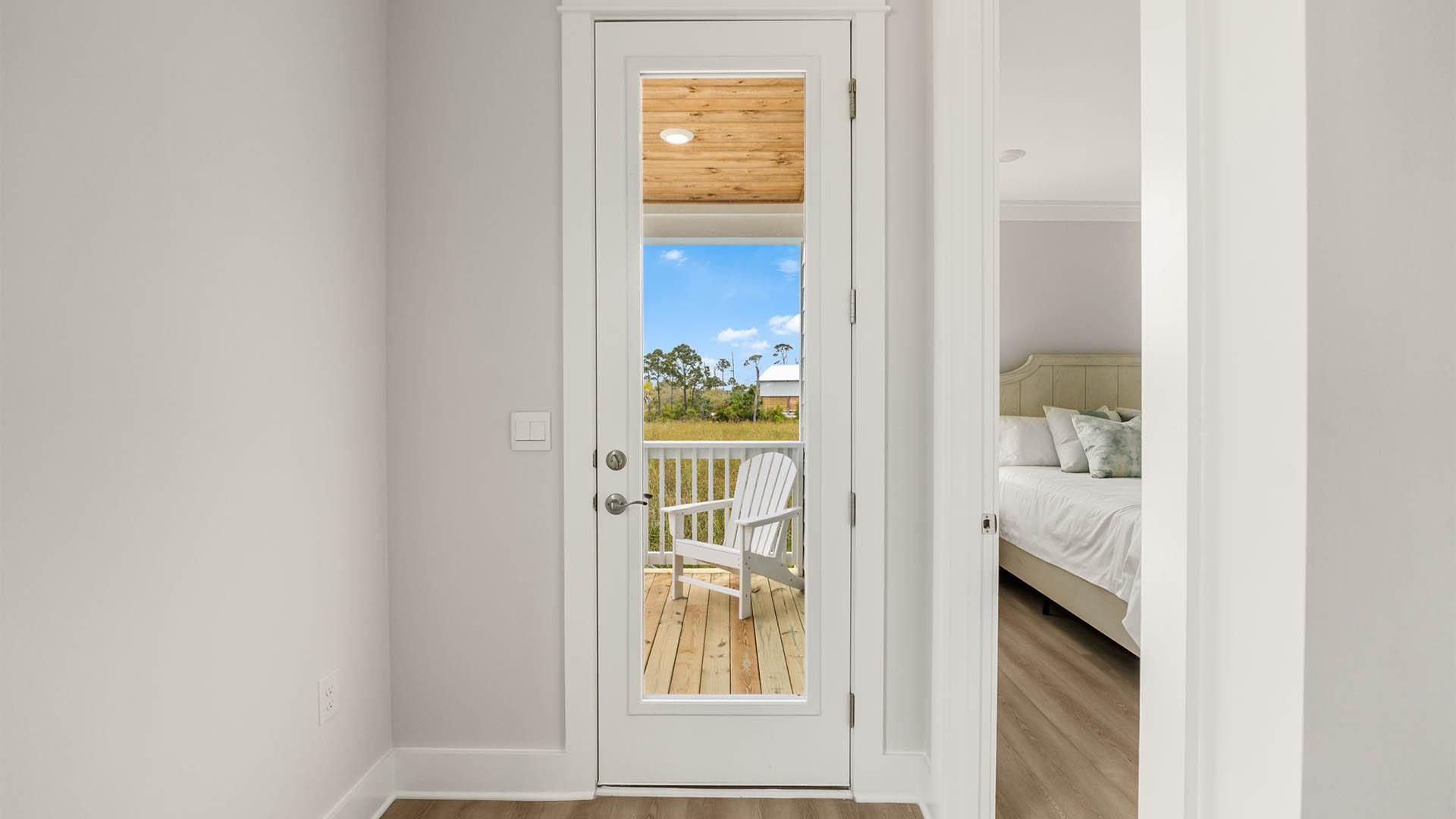 Front prairie door next to front bedroom.