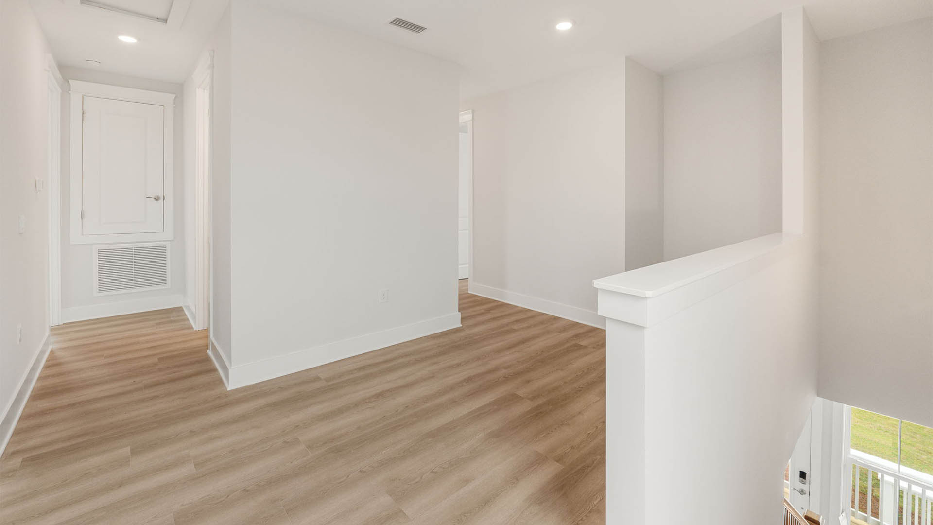 Upstairs foyer with EVP flooring.