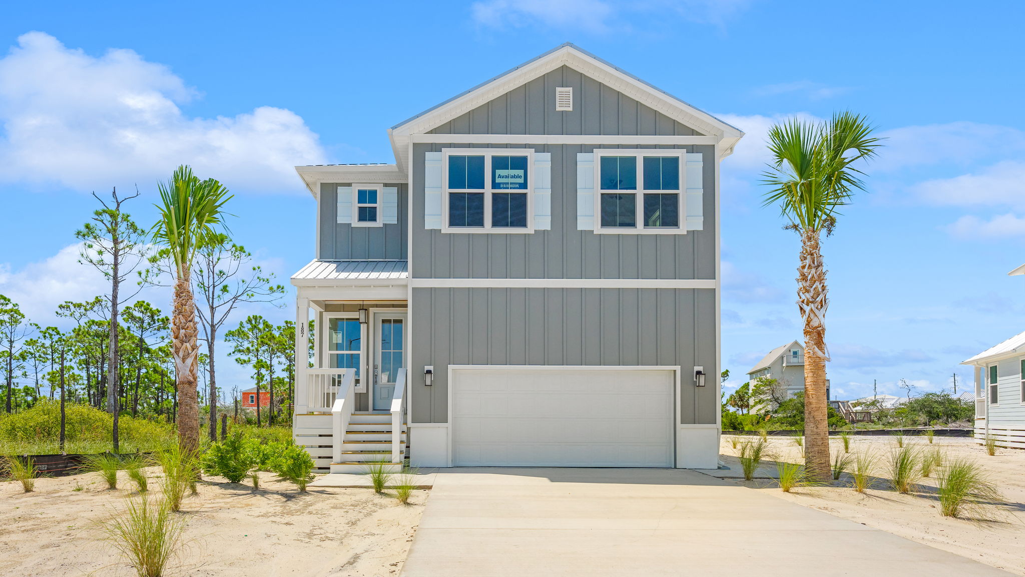 Key Largo floor plan at Redfish Cove with two car garage and covered front porch.