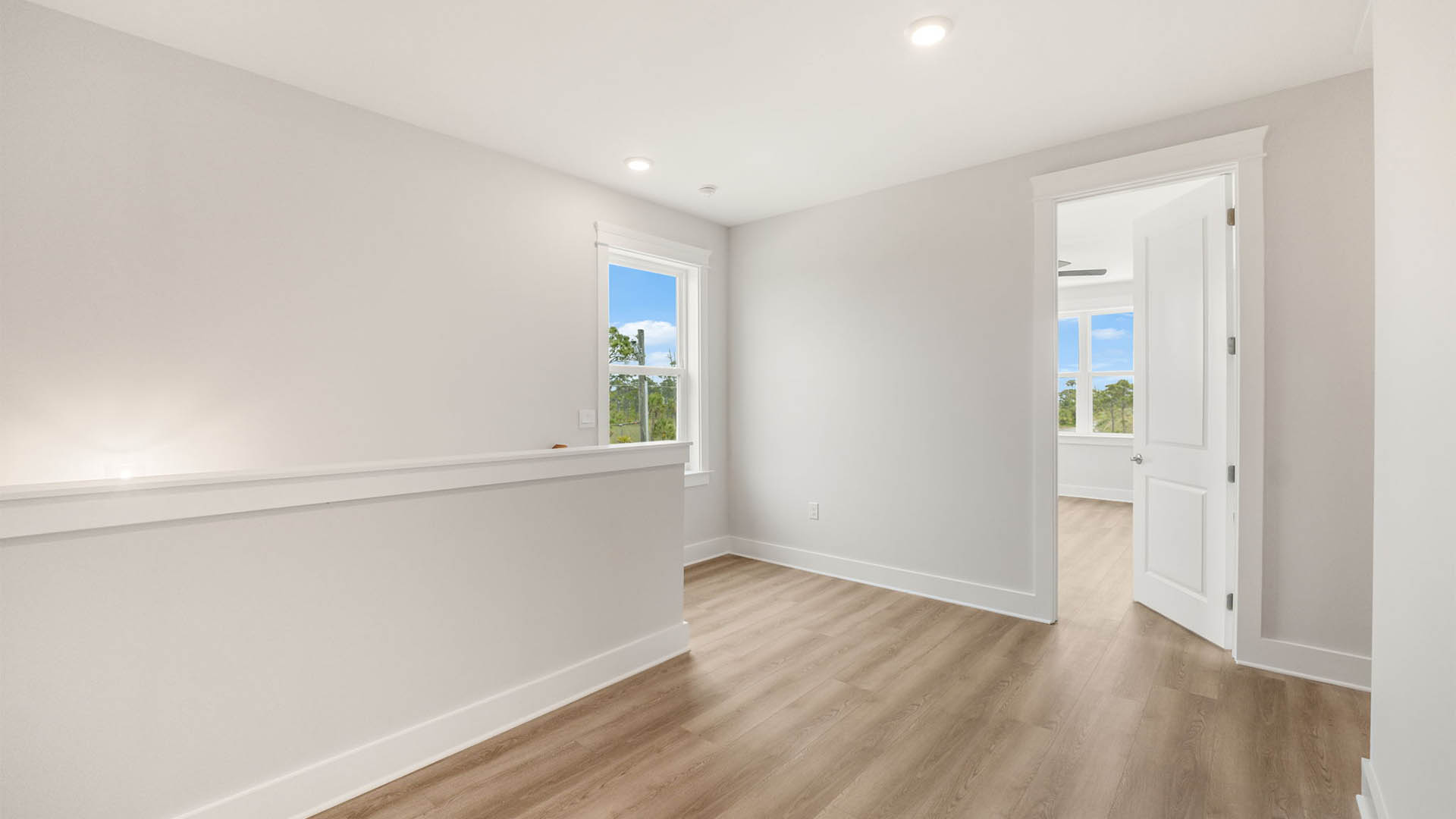 Upstairs foyer with EVP flooring.