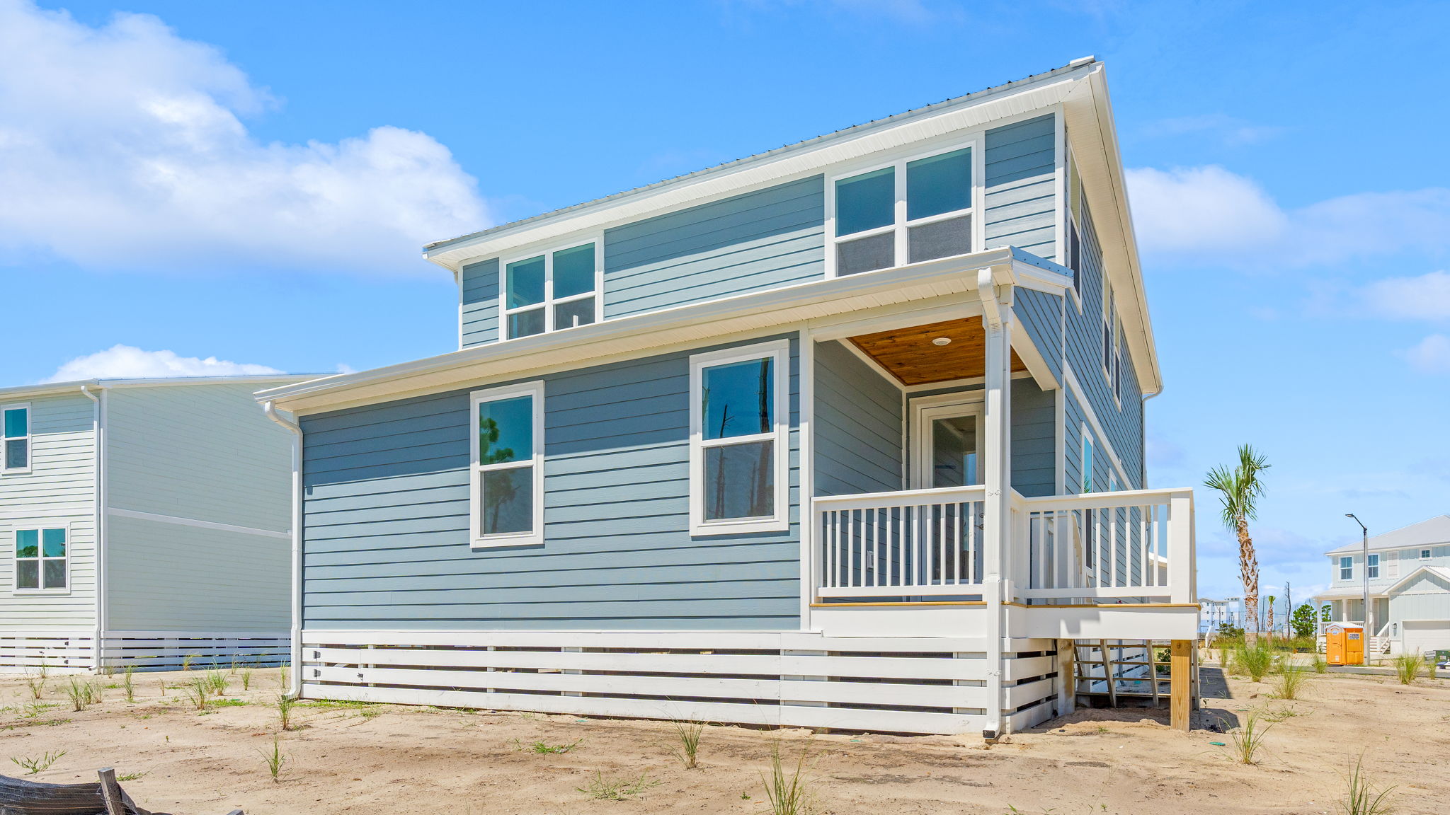 Key Largo floor plan at Redfish Cove with two car garage and covered rear porch.