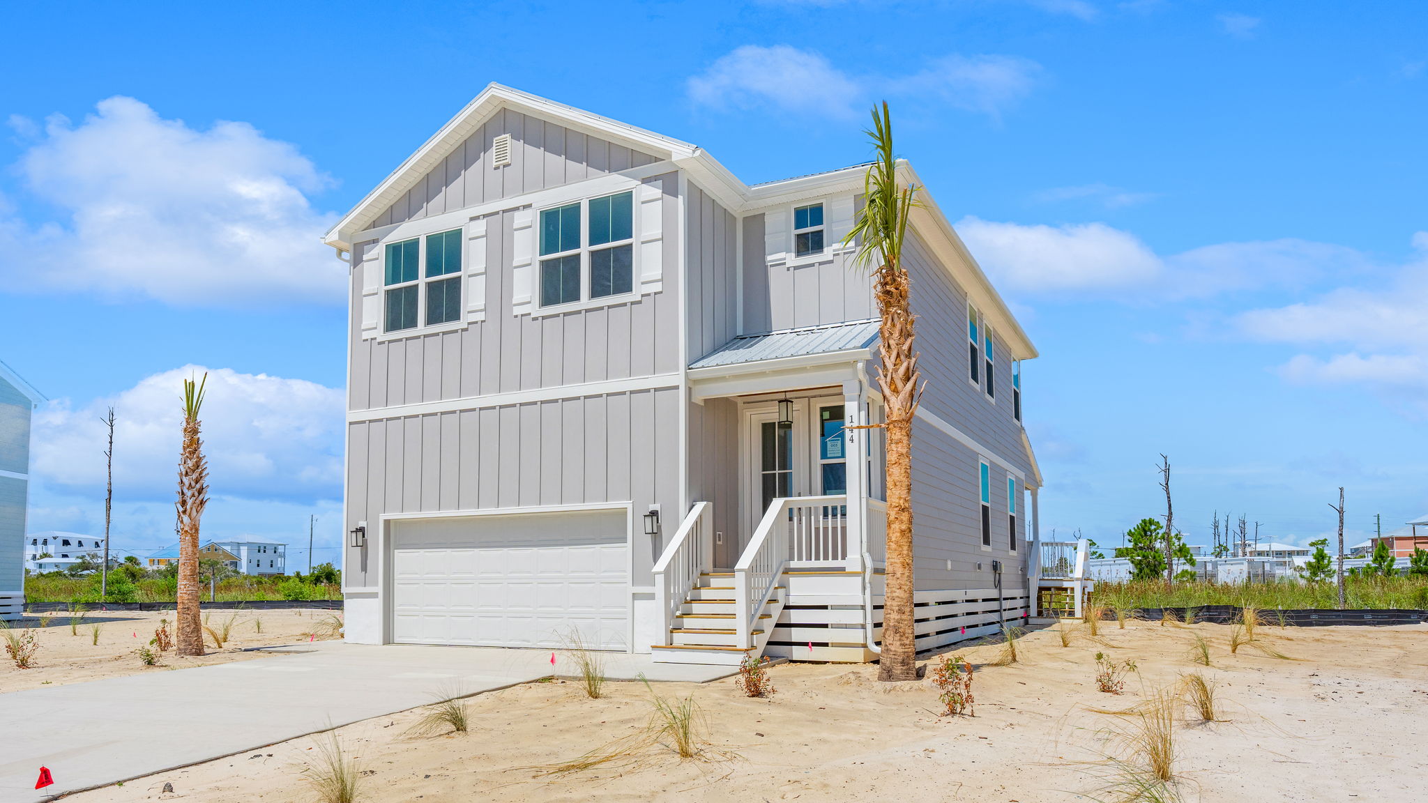 Key Largo floor plan at Redfish Cove with two car garage and covered front porch.