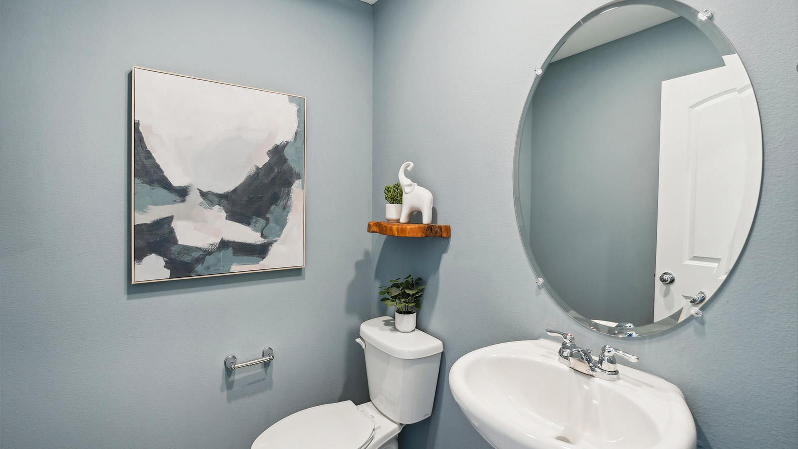 Powder bathroom with pedestal sink