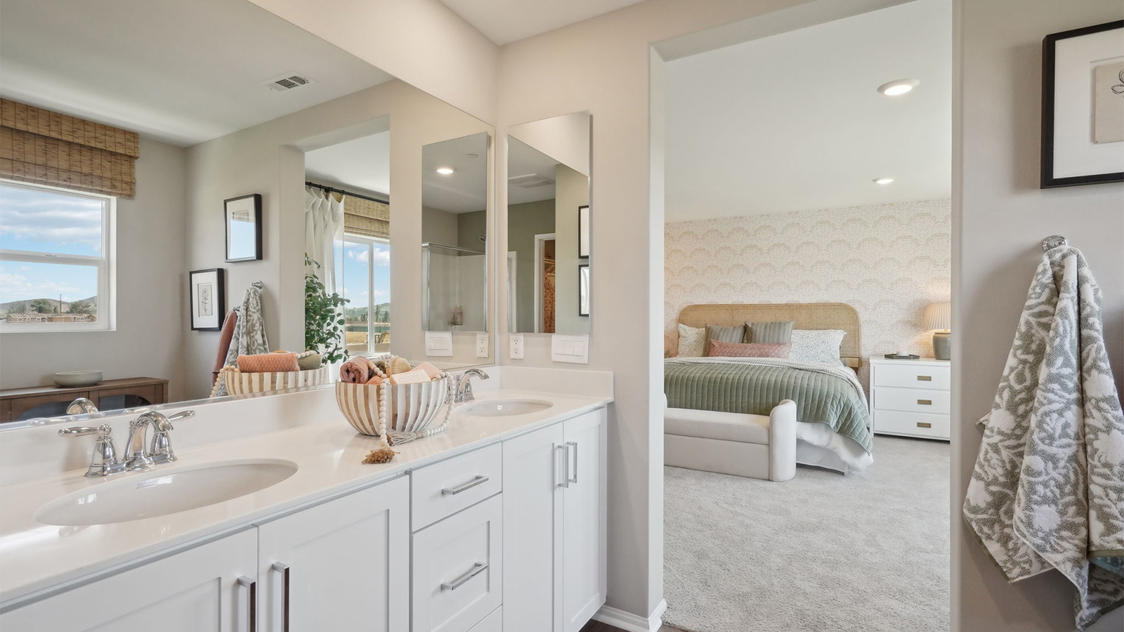 Primary bathroom with dual vanities