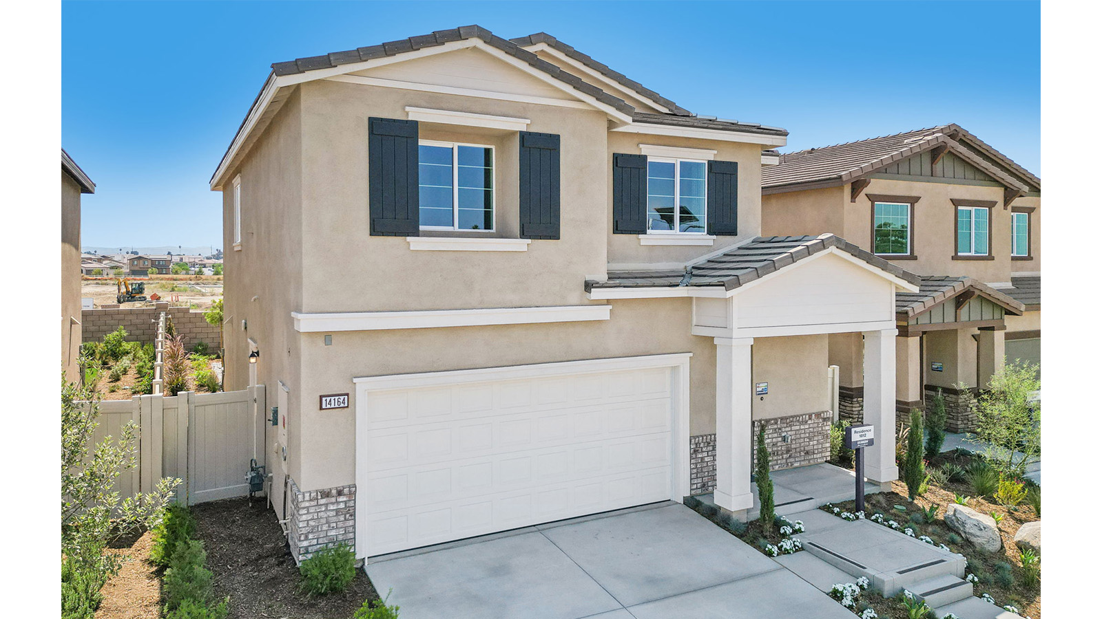 Two-story model home with two-car garage