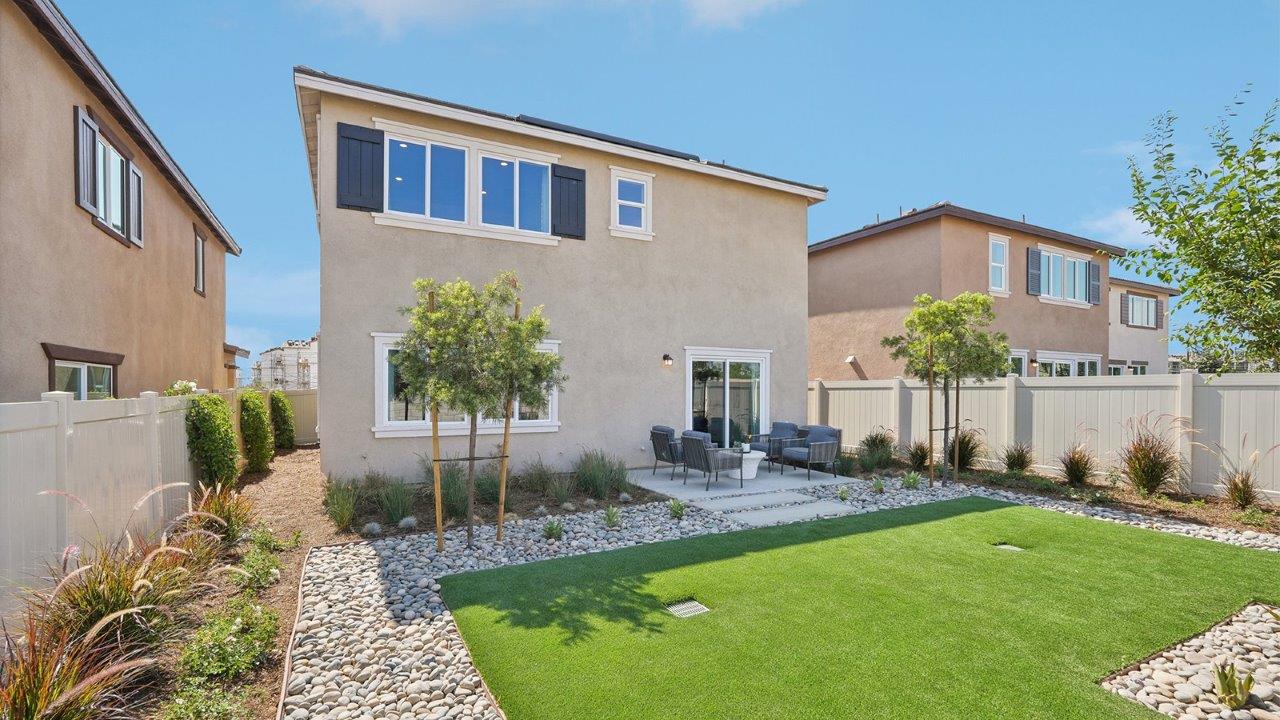 Spacious backyard with patio area