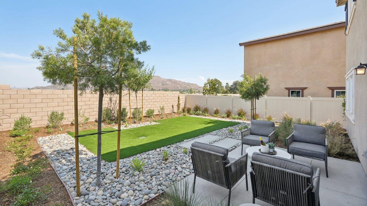 Spacious backyard with patio area