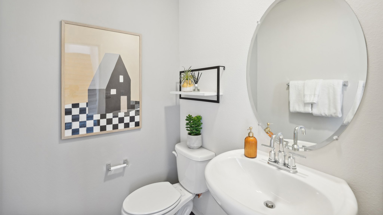 Powder bathroom with pedestal sink