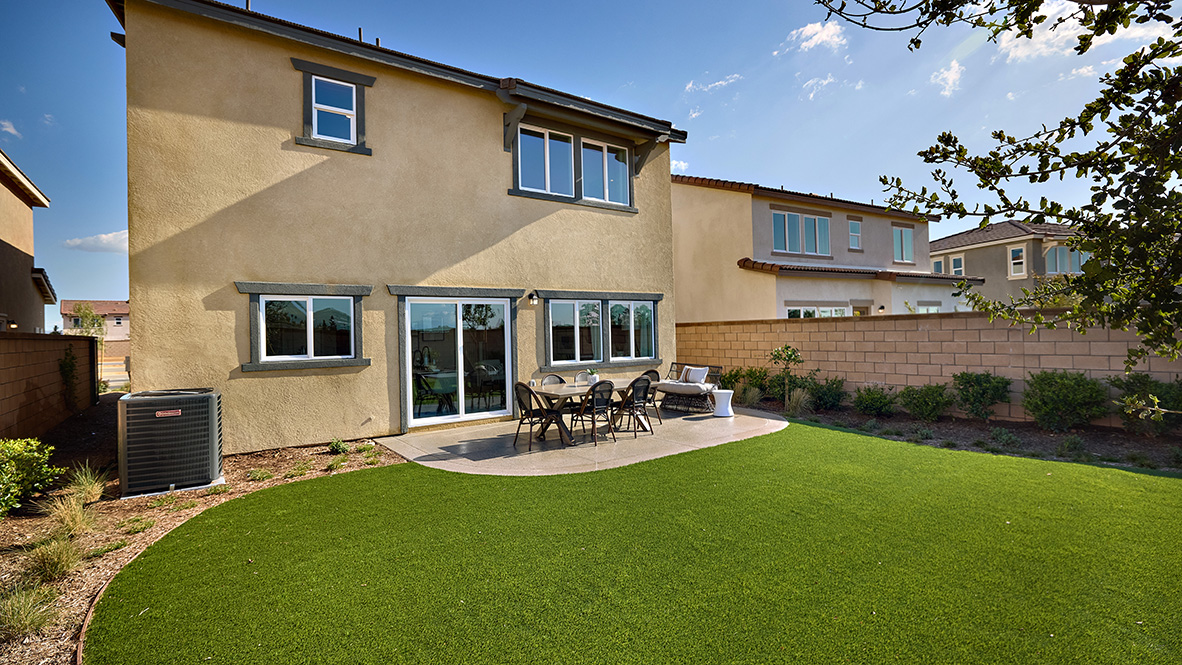 Spacious backyard with patio area