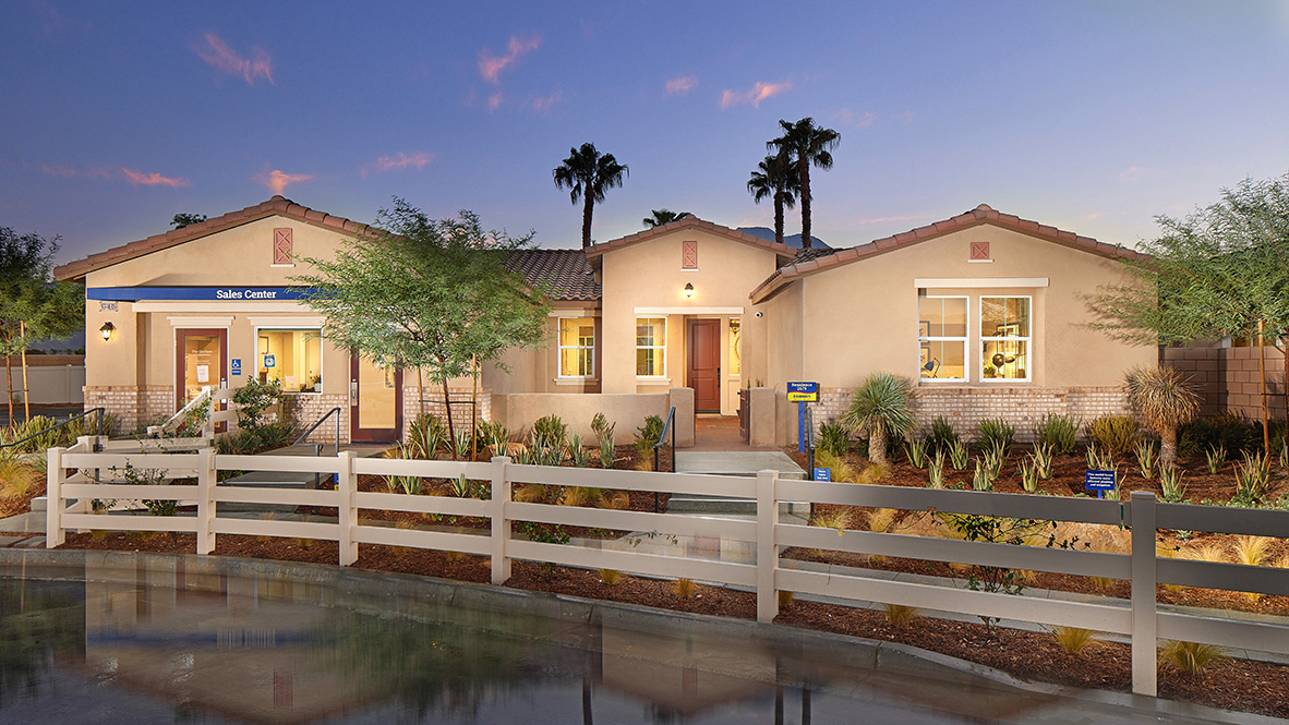 One-story Tuscan home with stone veneer and two-car garage