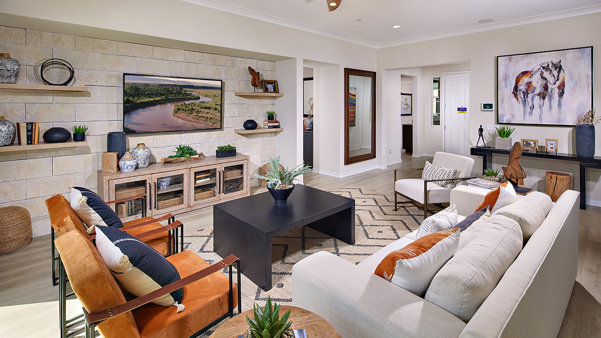 Open-concept great room with laminate flooring