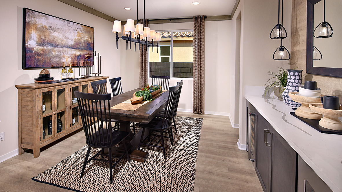 Open-concept dining room with laminate flooring