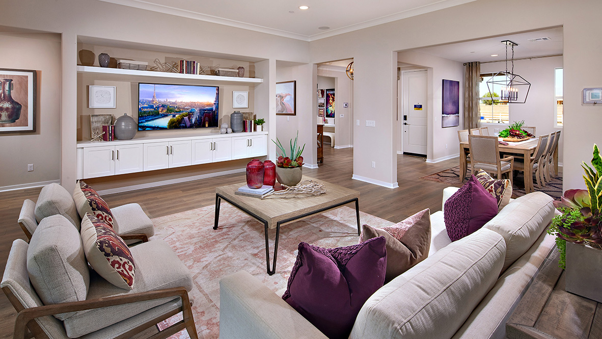 Open-concept great room with laminate flooring