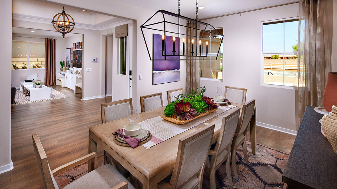 Open-concept dining room with laminate flooring