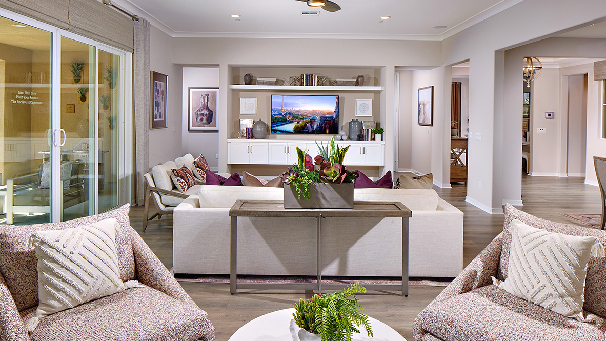 Open-concept great room with laminate flooring