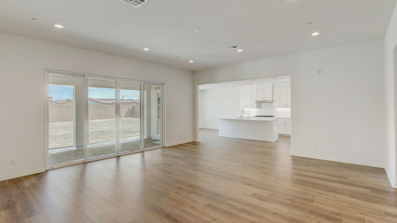Spacious open-concept great room, dining room and kitchen