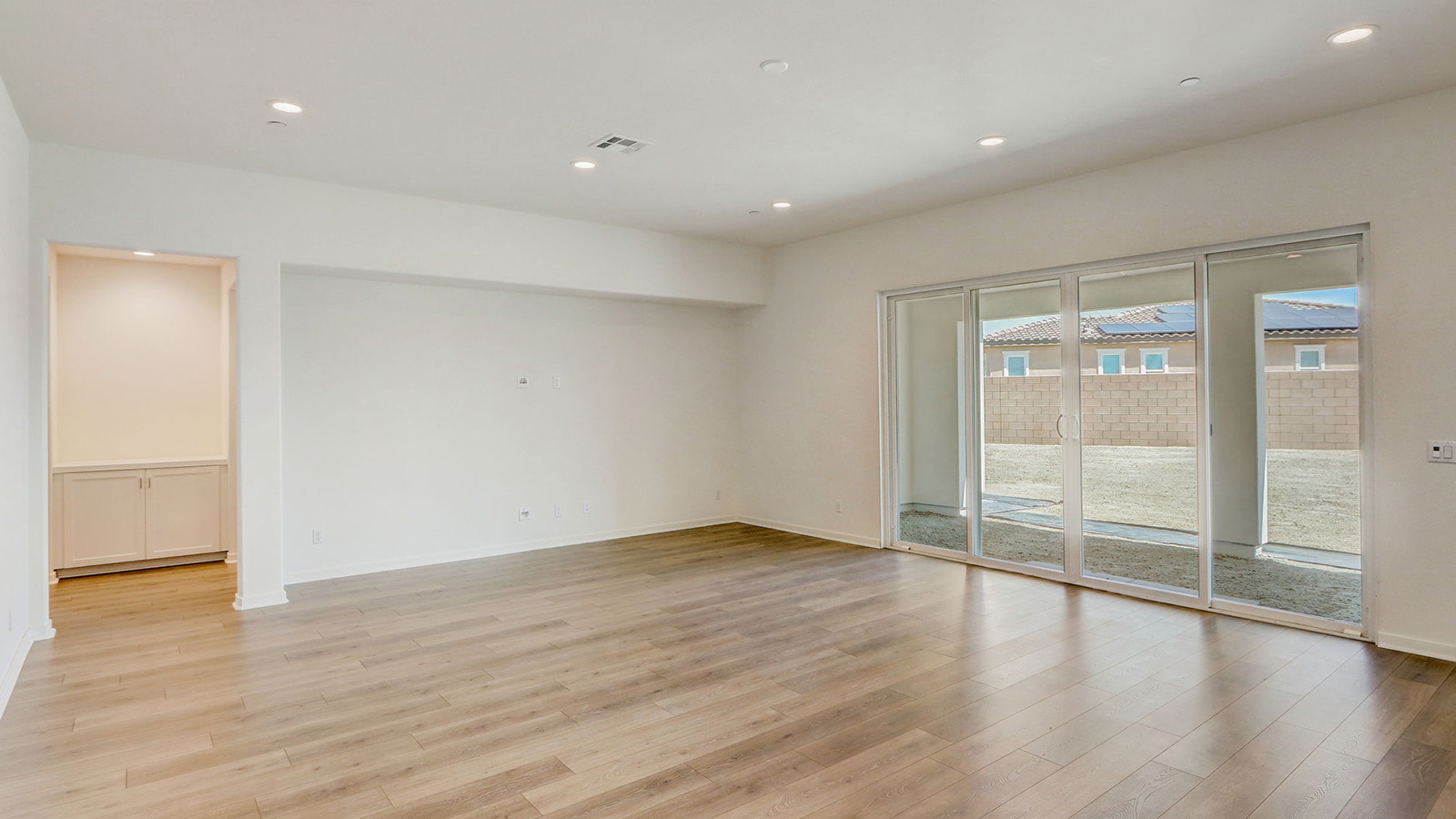 Spacious open-concept great room, dining room and kitchen