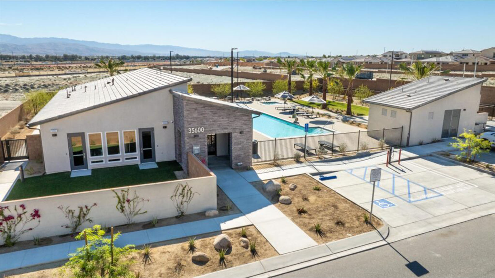 Exterior view of community recreation center and pool