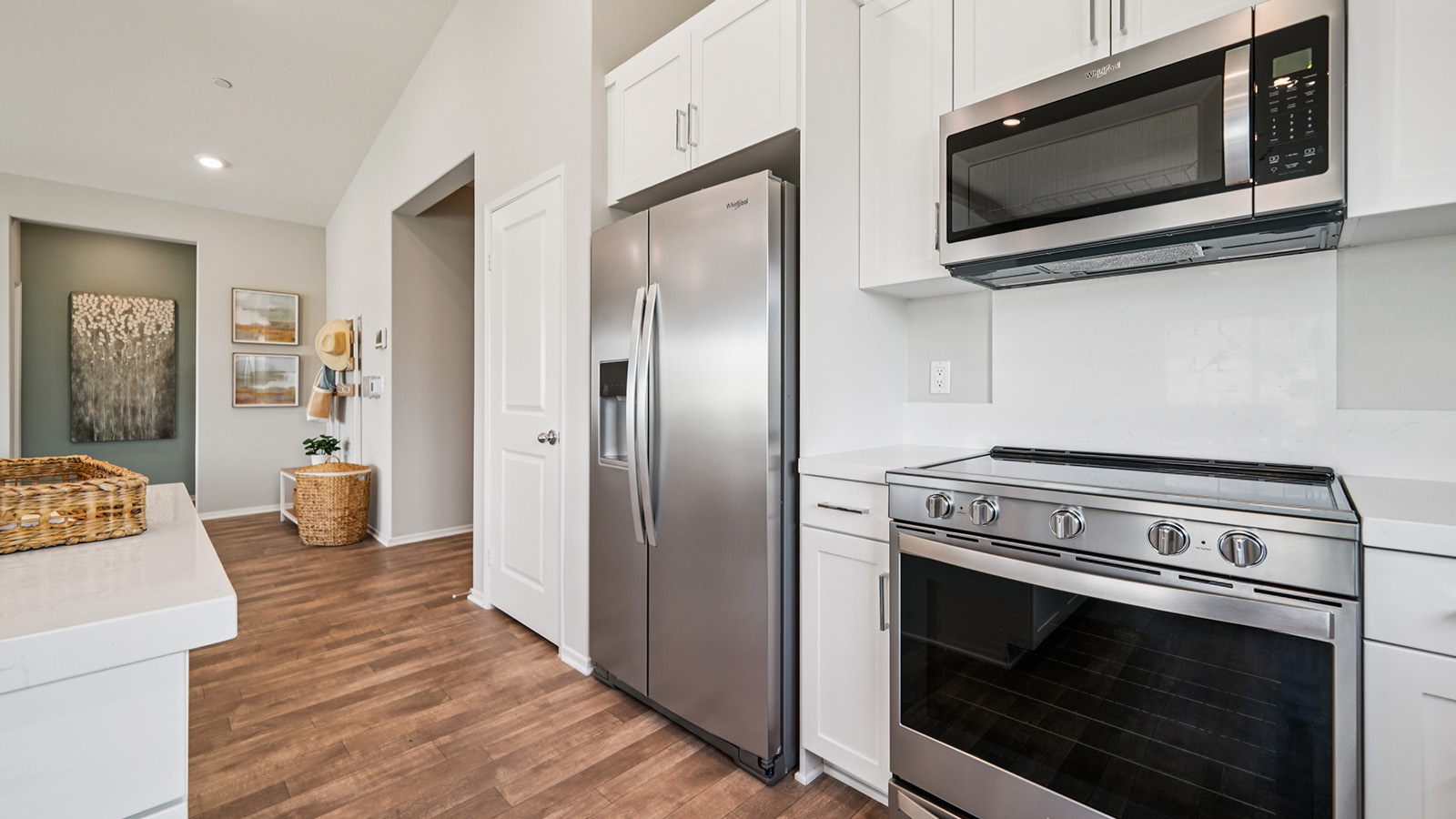 kitchen with white cabinets and stainless steel applicances