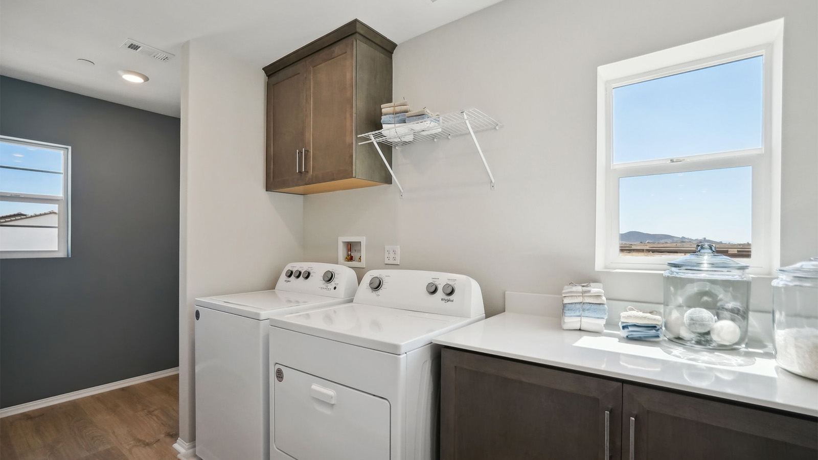 laundry room with cabinets