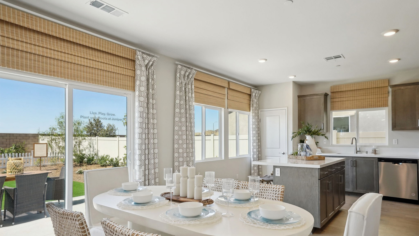 open concept great room kitchen and dining