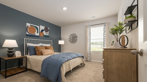 Spacious bedroom 2 with end tables and dresser