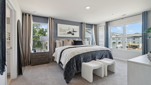 Spacious primary suite with walk in closet and oversized bath