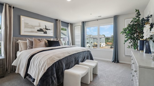 Spacious primary suite with walk in closet and oversized bath