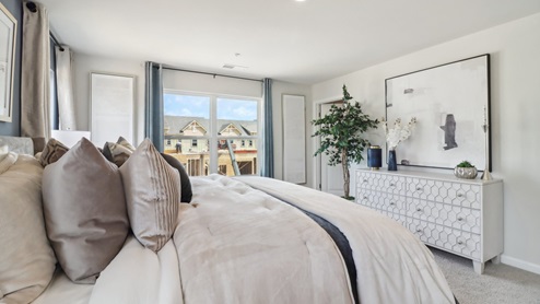 Spacious primary suite with walk in closet and oversized bath