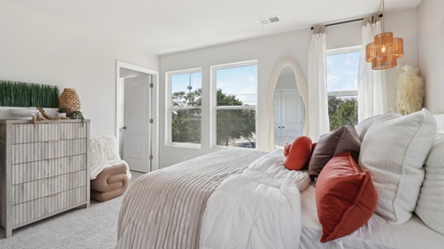 Spacious Bedroom 3 on the main floor with full bath